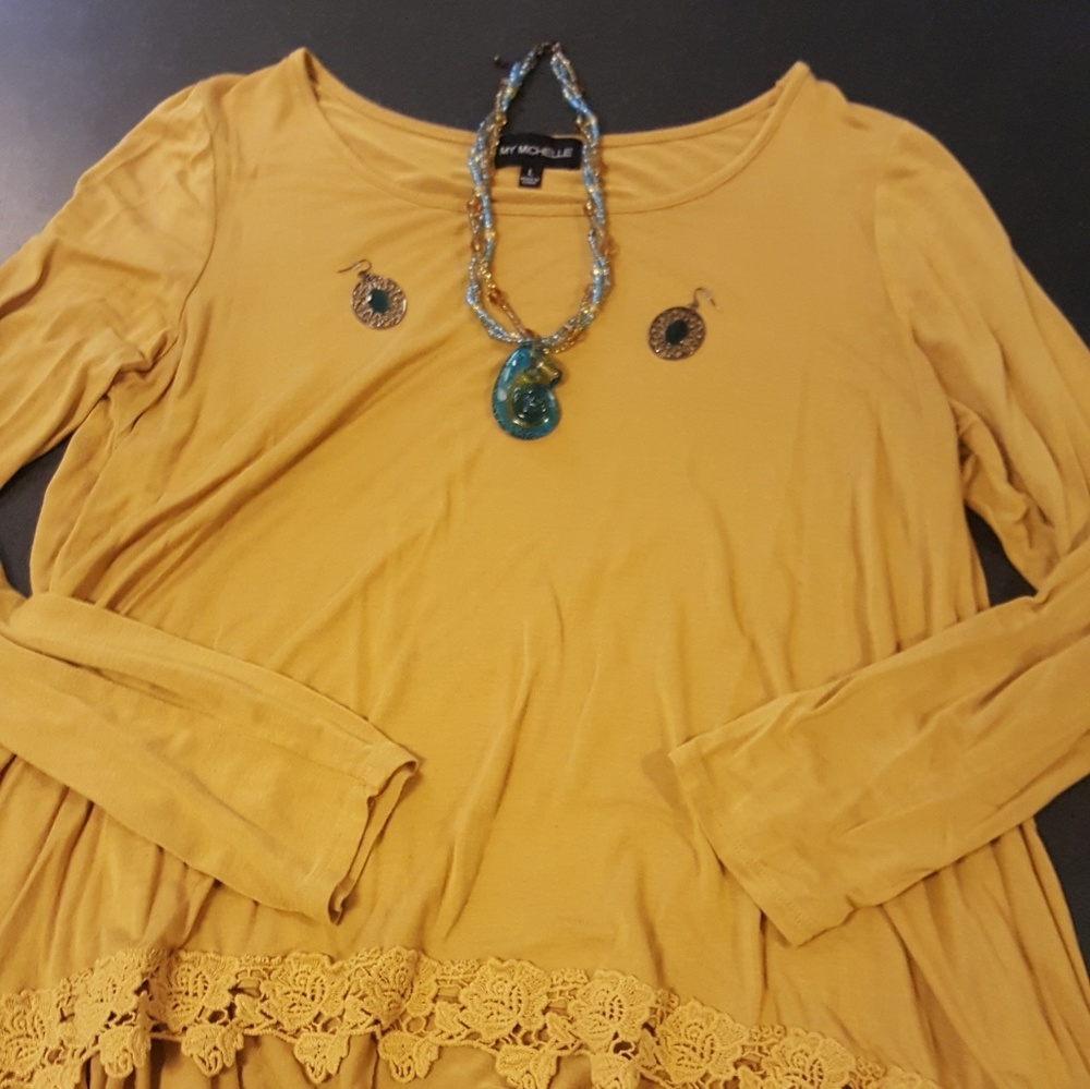 Long sleeve top with jewelry